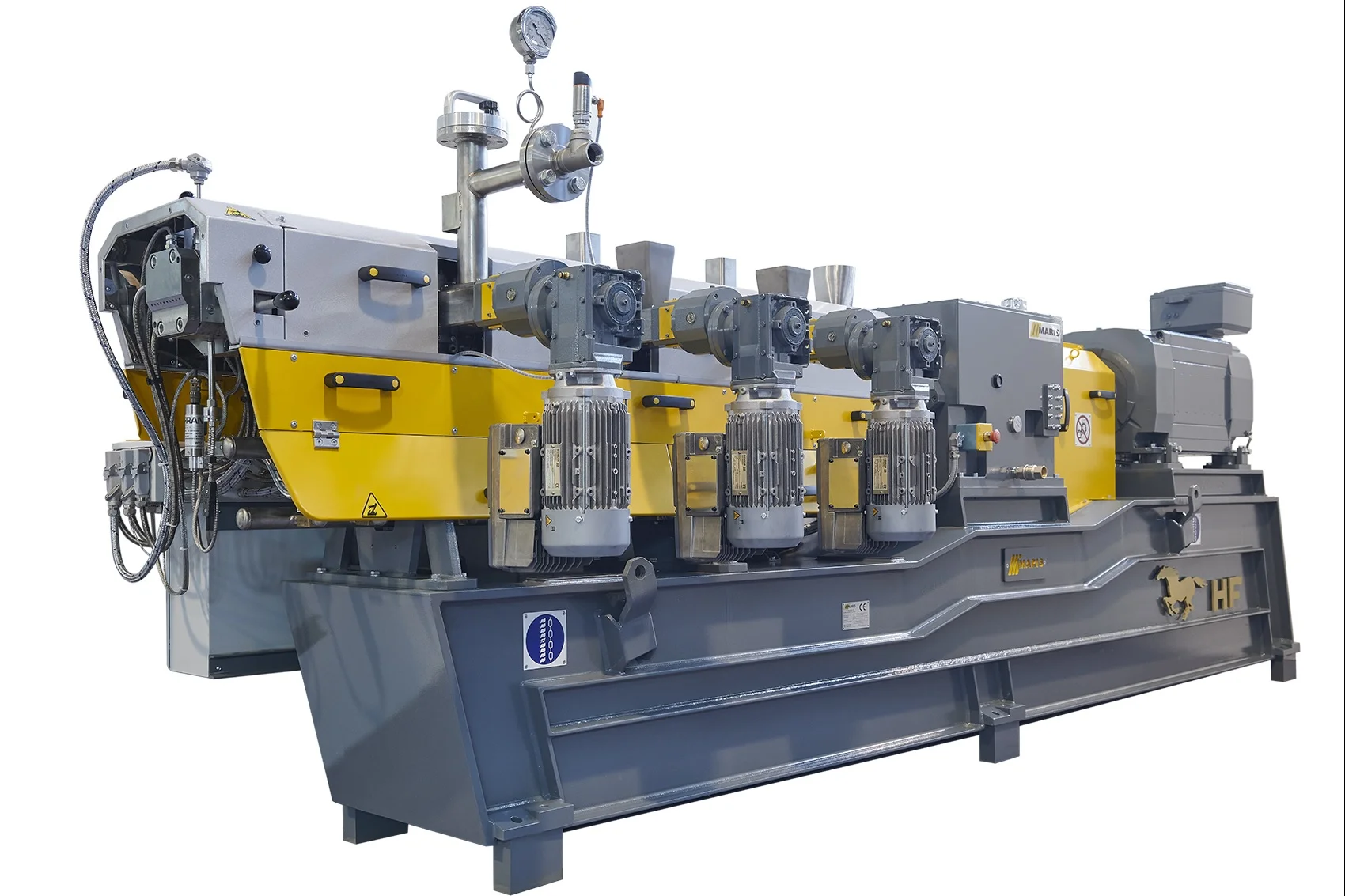 Twin-screw extruder with yellow and gray frame, multiple drive motors, feed ports, and control instrumentation for polymer processing. - MARIS F.LLI spa | Cpsemarketplace

