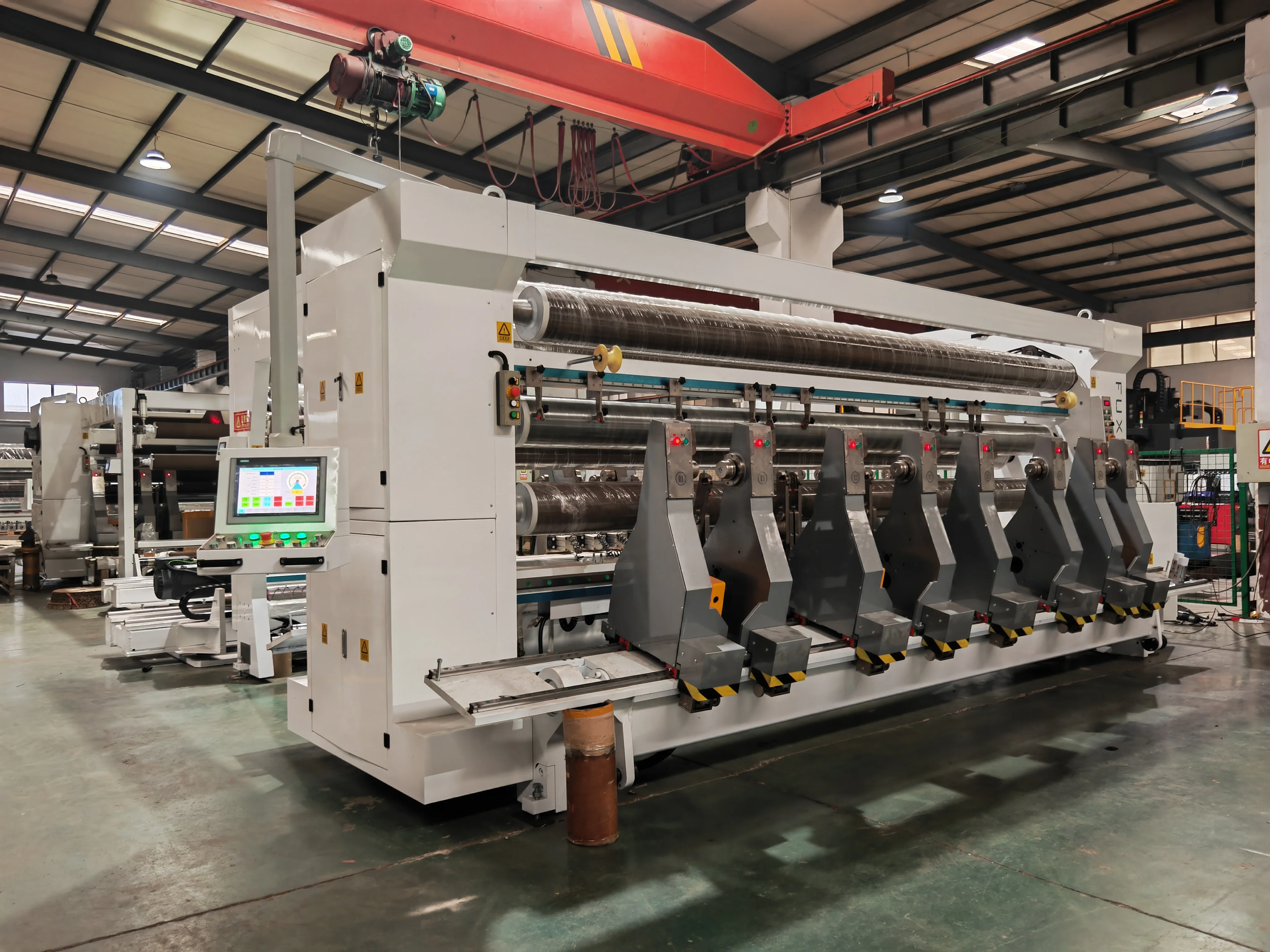 Industrial cutting machine with multiple roller assemblies and digital control panel for plastic film processing. - QINGZHOU FUXING INDUSTRIAL TECHNOLOGY CO.,LTD. | Cpsemarketplace

