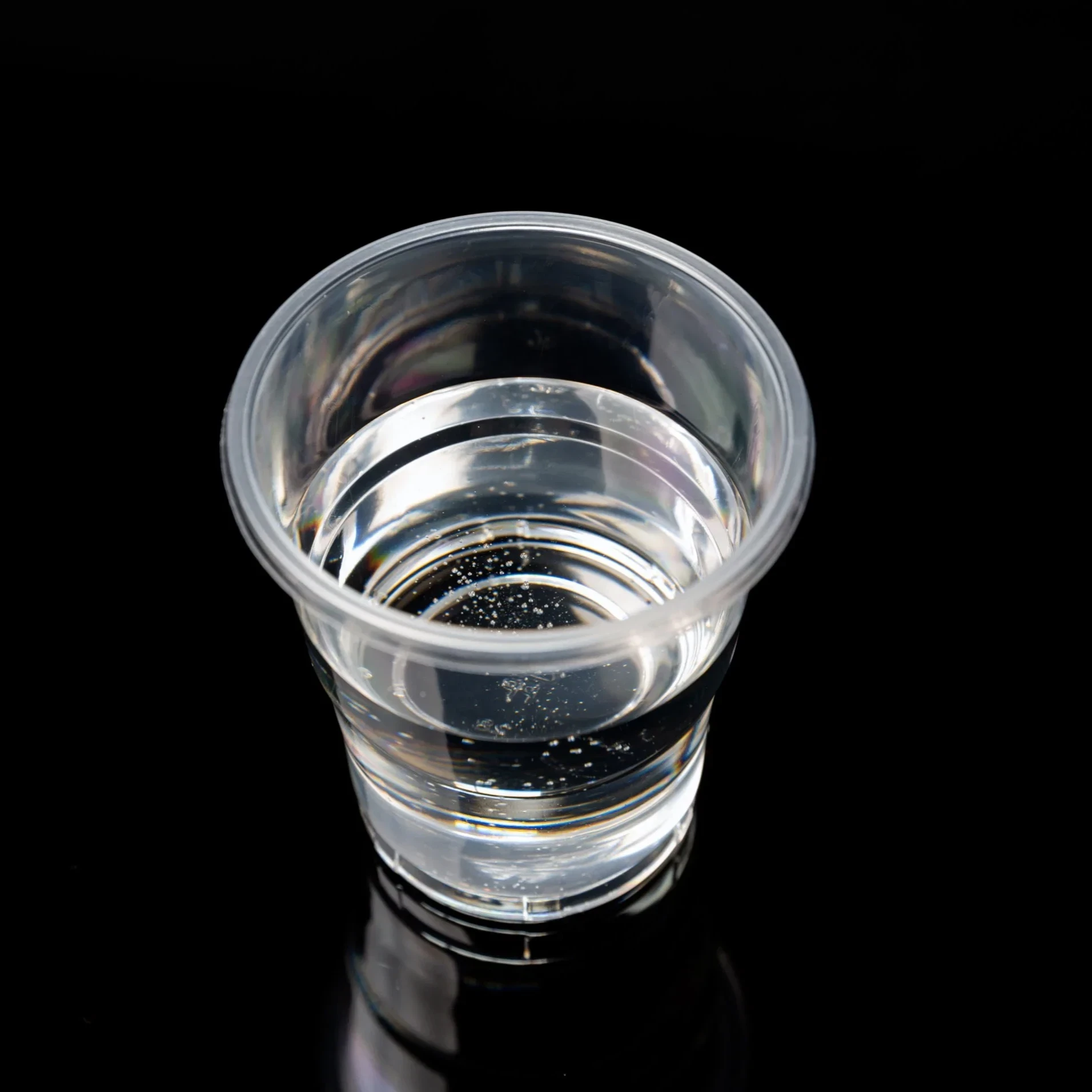 Transparent plastic cup containing clear liquid with suspended bubbles. - HUNAN TOLL CHEMICAL CO.,LTD | Cpsemarketplace

