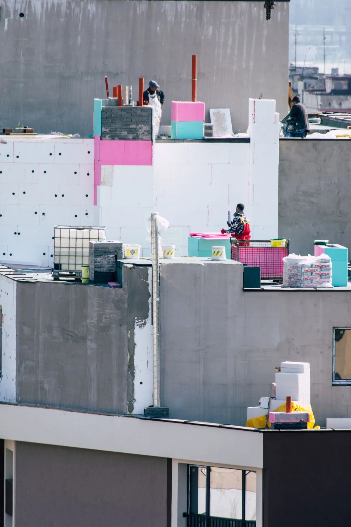 EPS foam insulation boards in white and colors for construction applications - Pexels

