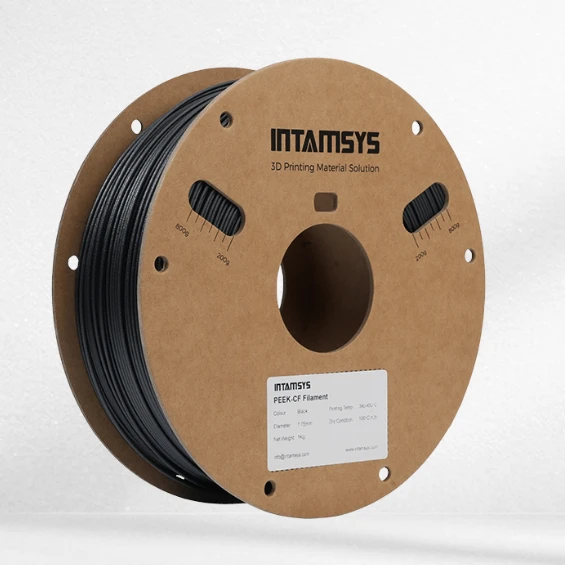 Black PEEK-CF filament spool wound on labeled cardboard reel with product specifications. - Dongguan Yuanzhu Intelligent Technology Co.,Ltd. | Cpsemarketplace

